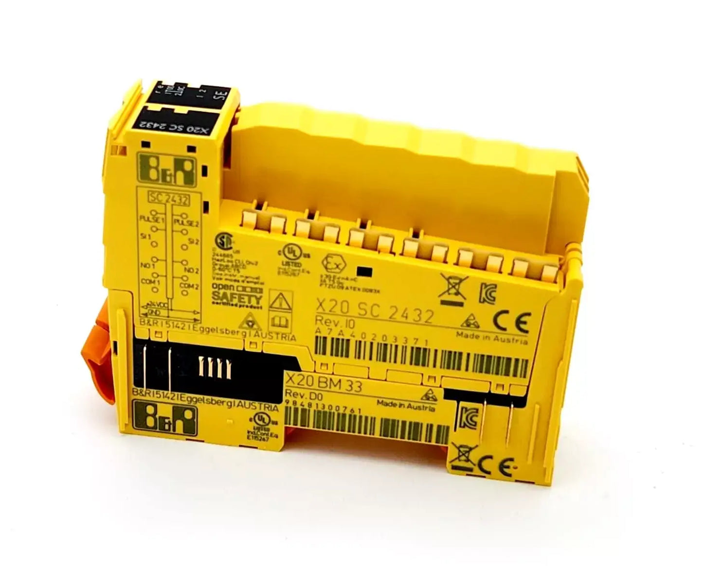 B&R X20SC2432 Safe Mixed Module 24 VDC 0xA7A4 with 2 digital inputs, pulse outputs, and relay outputs shown in yellow casing.