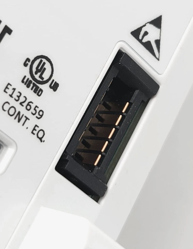 Close-up view of Lenze 16131825 i510 Inverter I51AE222F10V10001S 2.2kW/3HP connectivity port and safety symbol.