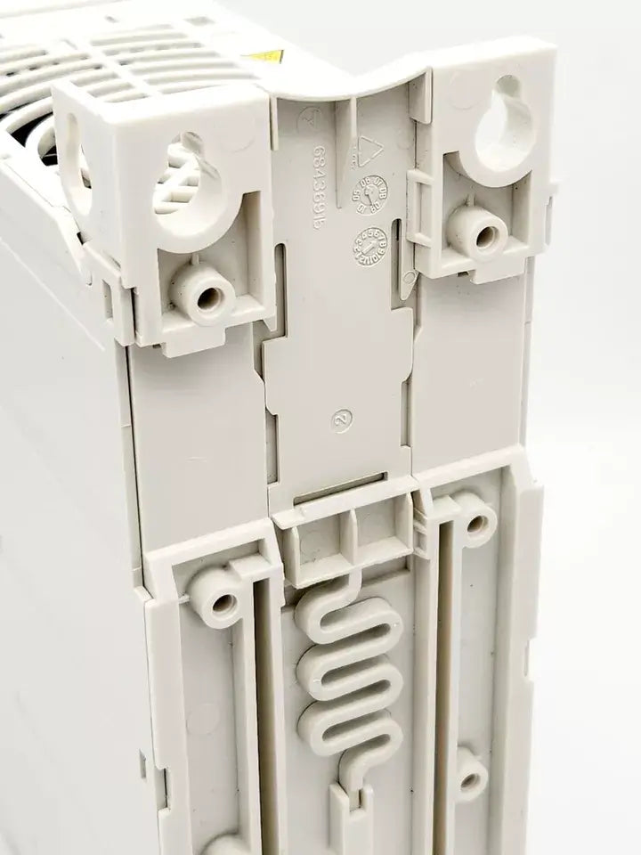 Close-up of ABB ACS150-01E-02A4-2 Frequenzumrichter 0,37 kW 240 VAC / 2,4 A 500Hz, showing intricate details of its structure.