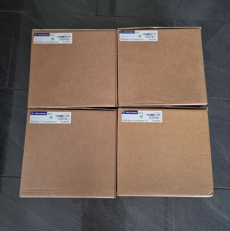 Boxes of Hirschmann 942-094-999 RSP-06002T1TT-SCCZ9HSE2S | SW Rel. 07.1.00 switches, new and unused, labeled and stacked.