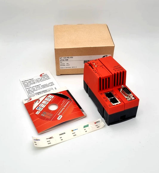 Hilscher 1712.100 NT100-RE-RS Gateway Real-Time-Ethernet nach Modbus RTU industrial communication gateway with packaging and accessories.
