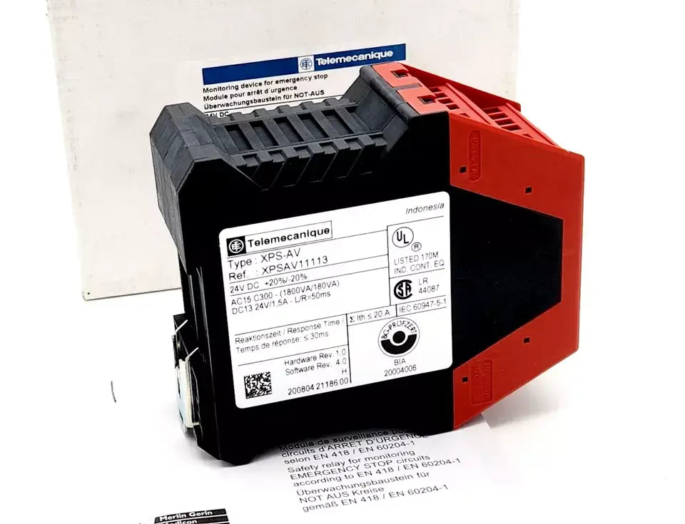 Telemecanique XPSAV11113 safety relay module with emergency stop and safety position monitoring, featuring direct and delayed relay contacts.