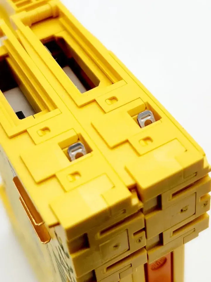 Close-up of yellow B&R X20SC2432 digital input module with secure digital and pulse outputs, showing detailed connectors.