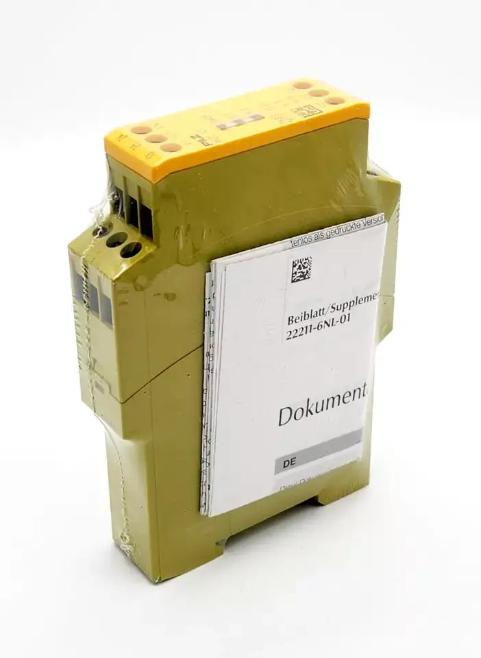 Pilz 774303 PNOZ X2 safety relay with manual, 24VAC/DC, standalone, front view showing integrated screw terminals.