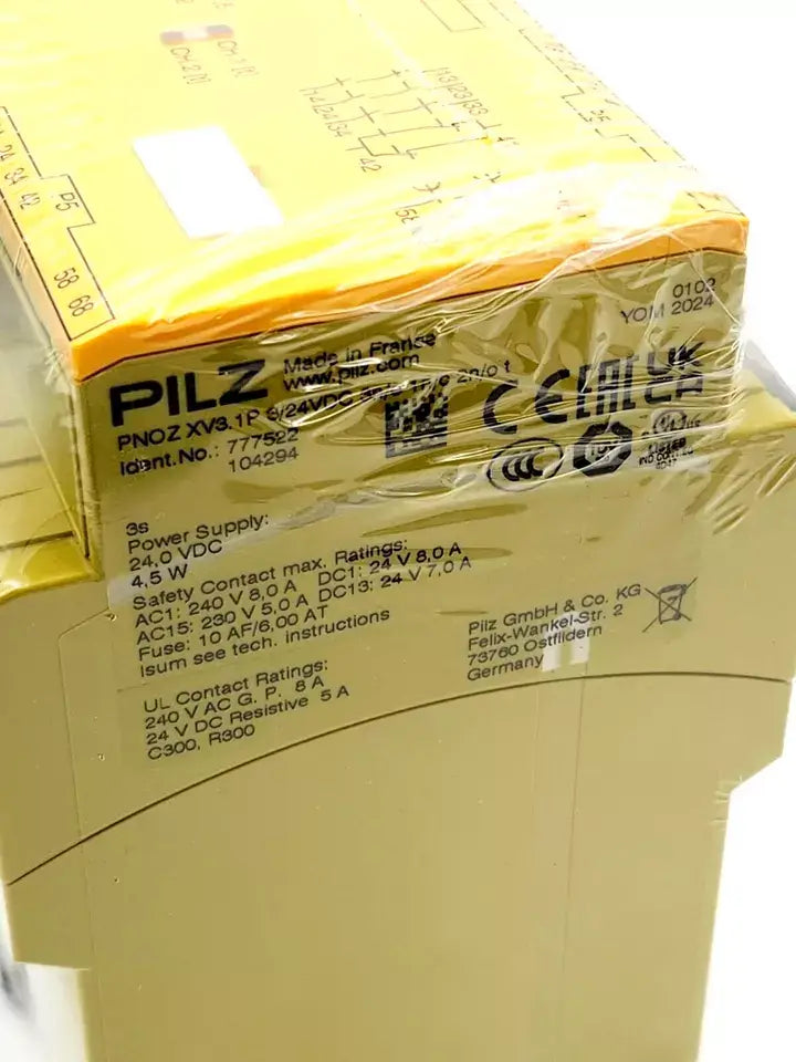 Pilz 777522 PNOZ XV3.1P safety relay package with specifications printed on the box.