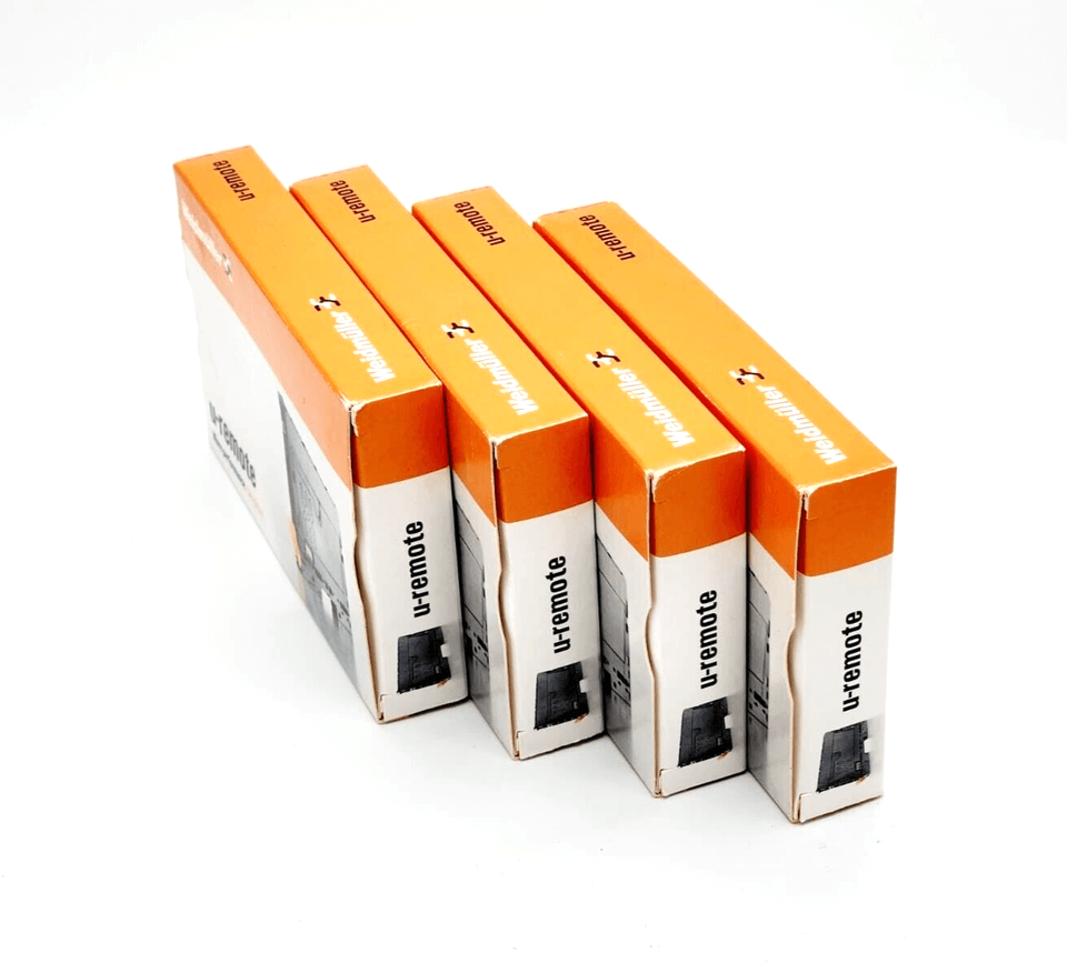 Four sealed boxes of Weidmüller 2705620000 UR20-2AI-UI-16 Analog-Input-Modul with original packaging in orange and white.