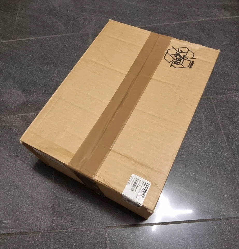 Sealed cardboard box containing EUCHNER 115138 MGB-L1B-PNC-L Auswertemodul und Busmodul