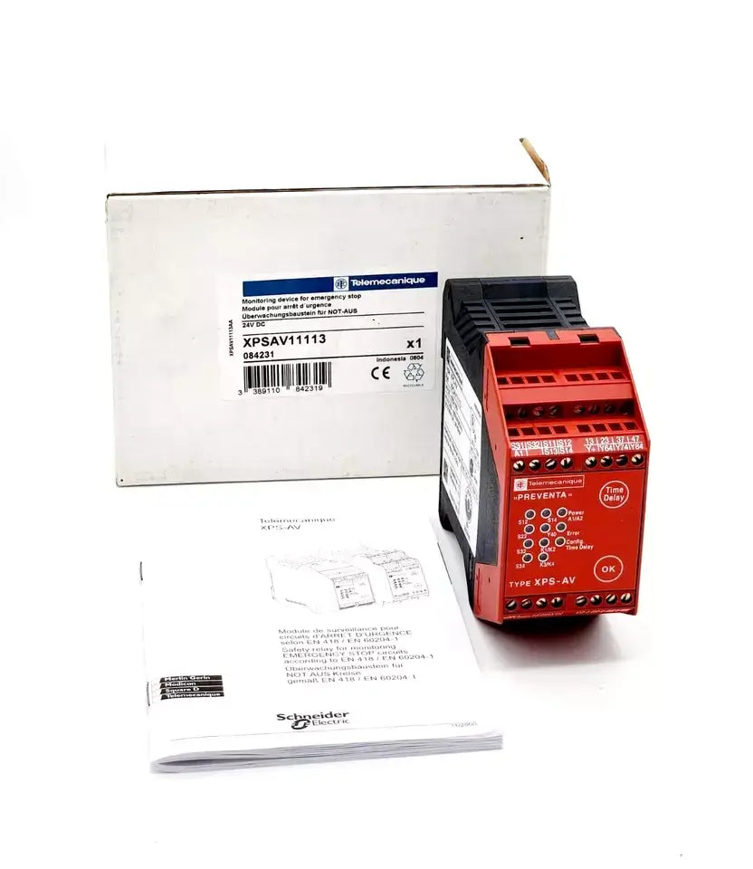 Telemecanique XPSAV11113 safety relay by Schneider Electric with package and manual, featuring emergency stop and safety switch functions.