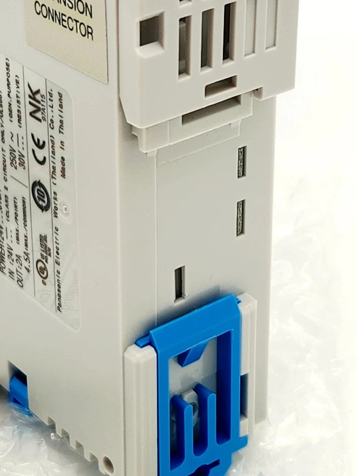 Close-up of Panasonic FPG-C24R2H-A Control Unit AFPG2423H-A Kompakt-SPS showing RS232C port and blue mounting bracket.