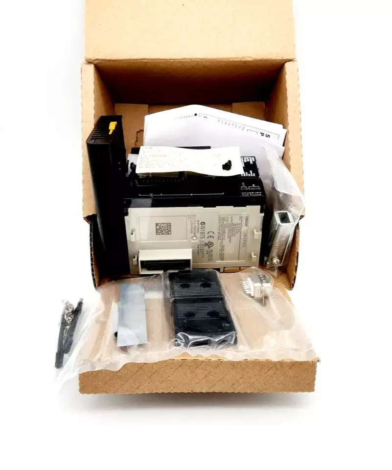 Omron CJ1M-CPU22 Version 4.0 PLC in packaging, showcasing high-performance features for SPS applications with accessories.