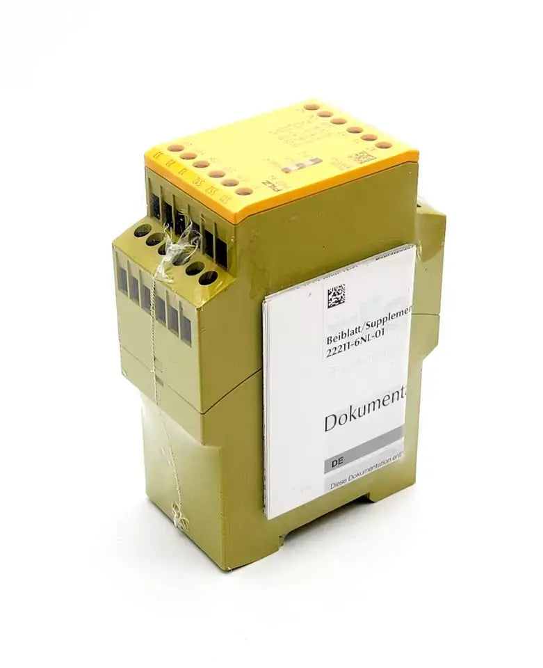 Pilz 774730 PNOZ X4 safety relay, 24VDC, module for emergency stop and protective door monitoring.