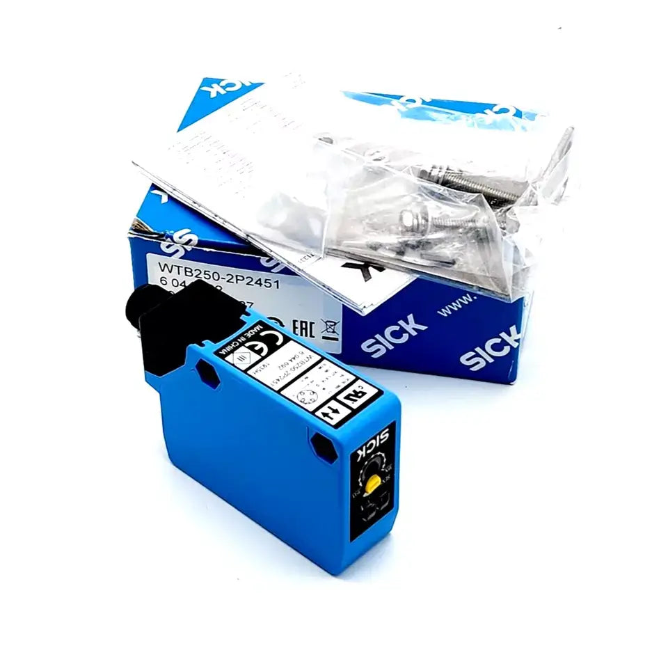 Sick 6044692 KOMPAKT-LICHTSCHRANKEN WTB250-2P2451 with packaging and accessories shown on a white background.