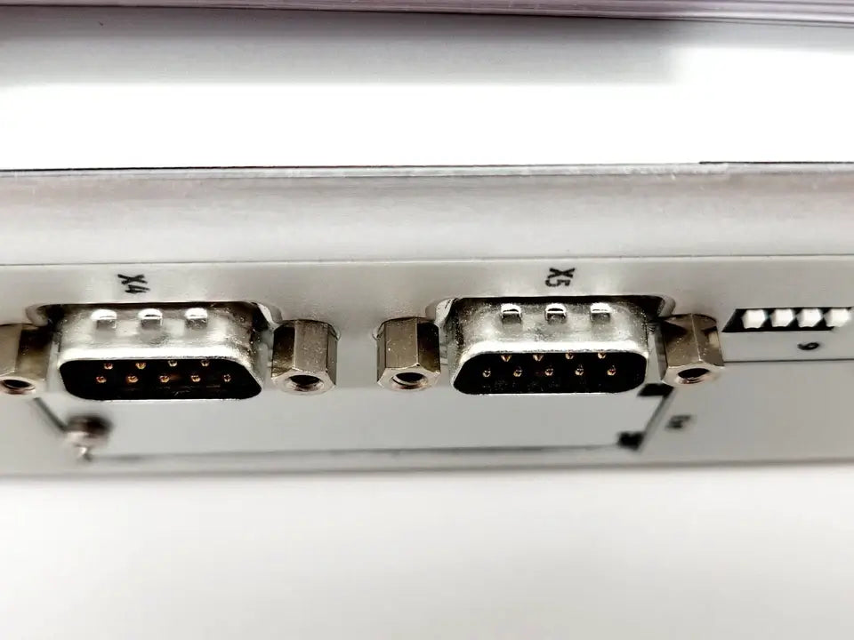 Close-up of Festo 572211 Motorcontroller CMMS-ST-C8-7-G2 connectors for servomotor control, showing dual ports with detailed view.