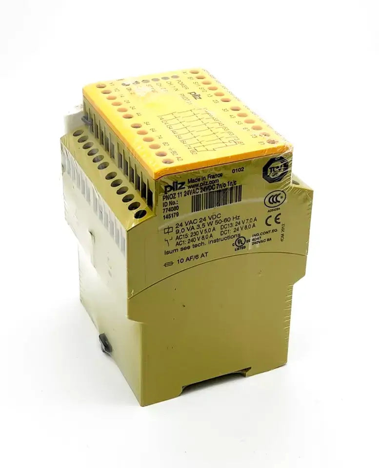Pilz 774080 PNOZ 11 safety relay, standalone, 24VAC/DC, 7n/o, 1n/c, for emergency stop and safety door monitoring.