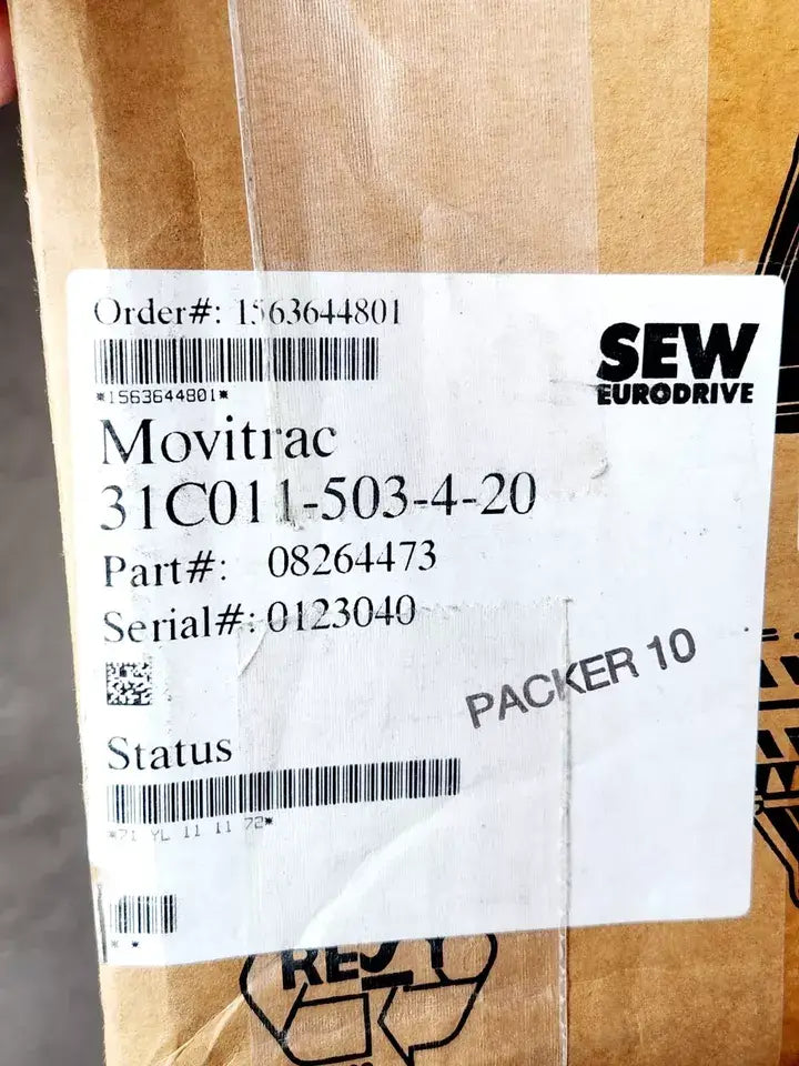 Label on SEW Eurodrive MOVITRAC 31C011-503-4-20 Antriebsumrichter packaging showing product details and serial number.