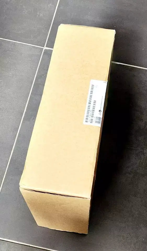 Sealed Siemens 6AV2128-3MB06-0AX0 SIMATIC HMI MTP1200 Panel in box on tiled floor.