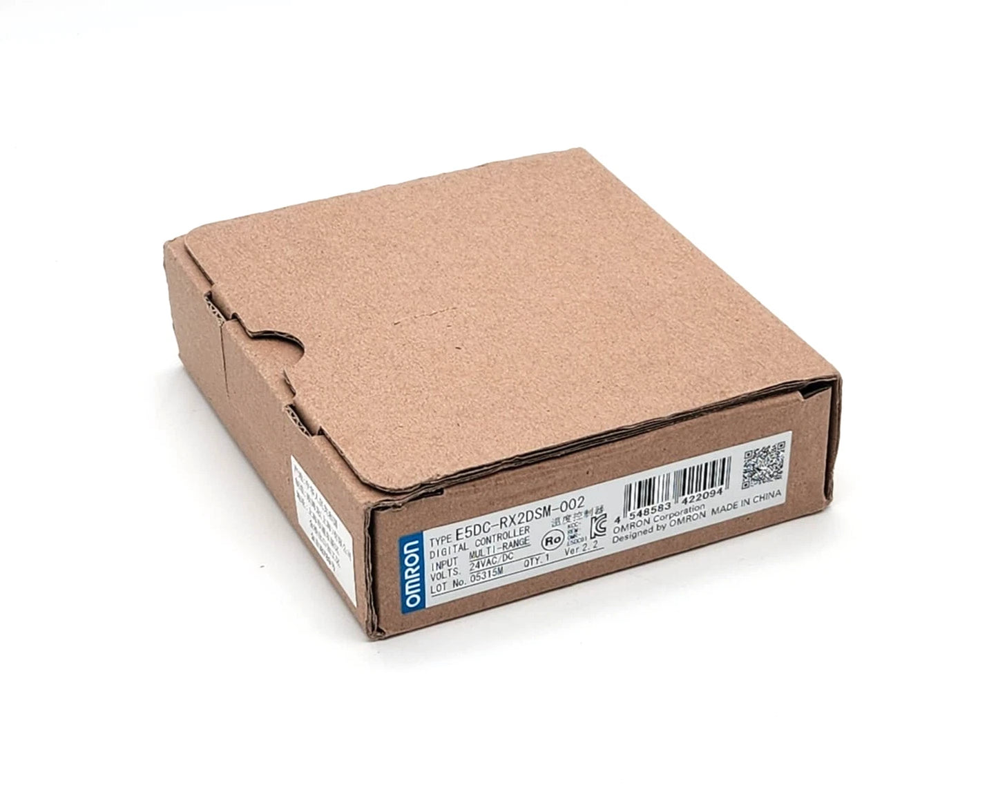 Omron E5DC-RX2DSM-002 Digitaler Temperaturregler 24V AC/DC in original packaging with model label visible.