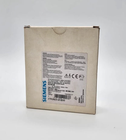 Siemens 3TK2823-2CB30 SIRIUS Sicherheitsschaltgerät AC/DC 24 V 2S packaging box with label and product details.