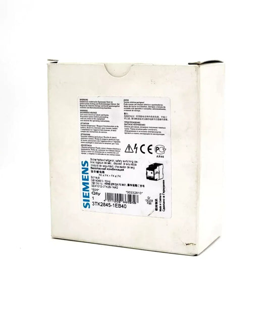 Siemens 3TK2845-1EB40 SIRIUS Sicherheitsschaltgerät DC 24 V packaging box showing product details and specifications.
