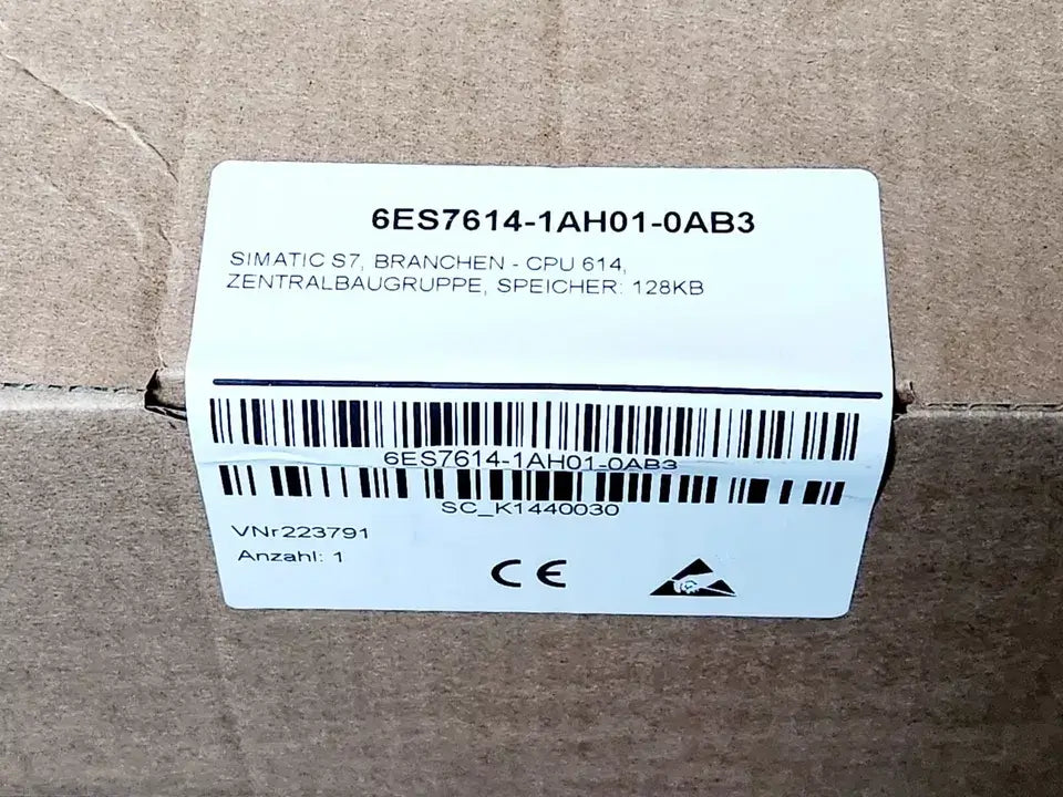 Box showing Siemens 6ES7614-1AH01-0AB3 SIMATIC S7 Branchen-CPU 614 | sealed, with product labeling and barcode visible.