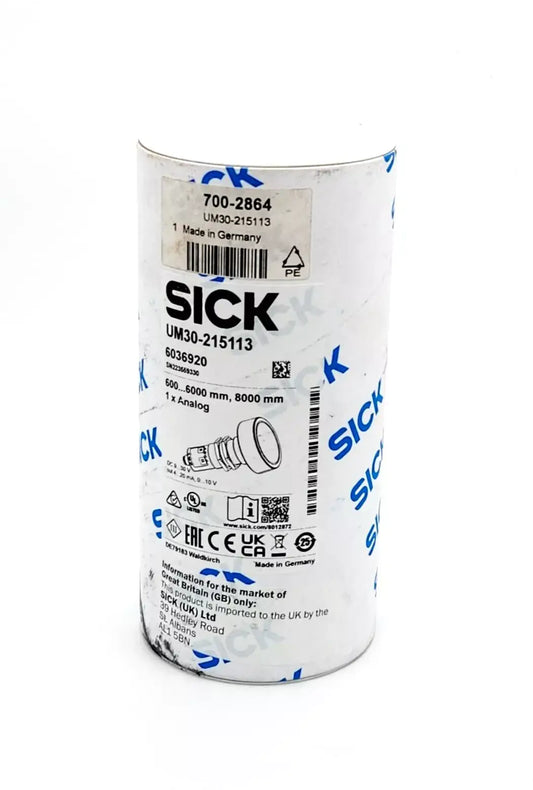 Packaging of Sick 6036920 UM30-215113 Ultrasound Distance Sensor, showing specifications and labeling, made in Germany.
