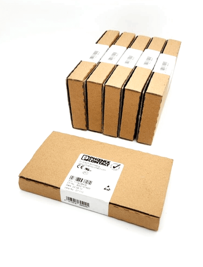 Phoenix Contact 2861302 Analogmodul product packaging in cardboard boxes, showing front labels and serial details.
