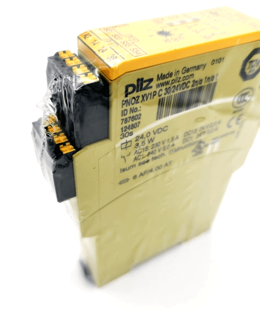Pilz 787602 PNOZ XV1P C safety relay device with 30/24VDC 2 n/o 1 n/o t, made in Germany, product view with packaging.