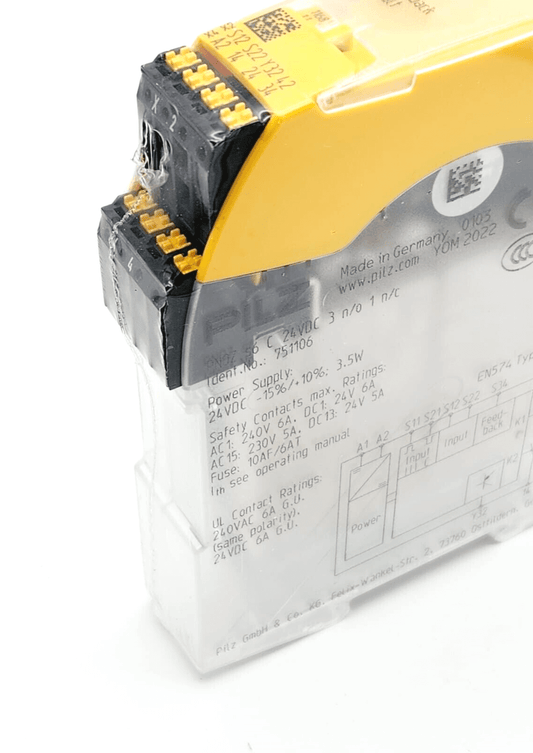 Pilz 751106 PNOZ s6 C safety relay 24VDC, 3 n/o, 1 n/c connections, yellow module with label and specifications visible.
