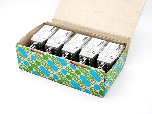 Open box with Phoenix Contact 2823405 relays ST-REL4-HG 24/21-21, featuring Hengstler small round relays with dual changeover contacts.