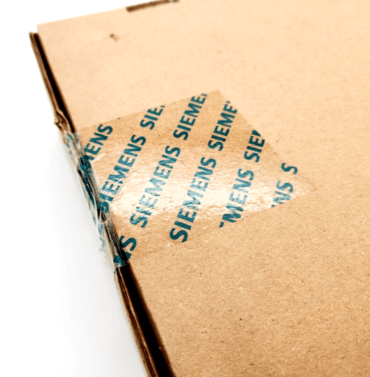 Sealed Siemens 6SL3210-5HB10-4UF0 SINAMICS S210 packaging, featuring branded tape on a cardboard box.