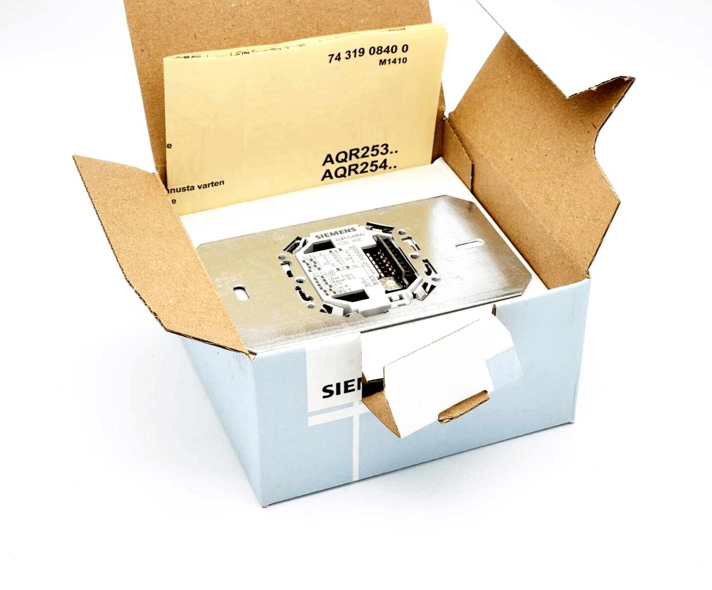Siemens AQR2548NG base module with integrated VOC and CO2 sensor, shown in a partially opened box.