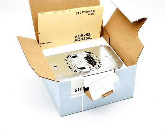 Siemens AQR2548NG base module with integrated VOC and CO2 sensor, shown in a partially opened box.