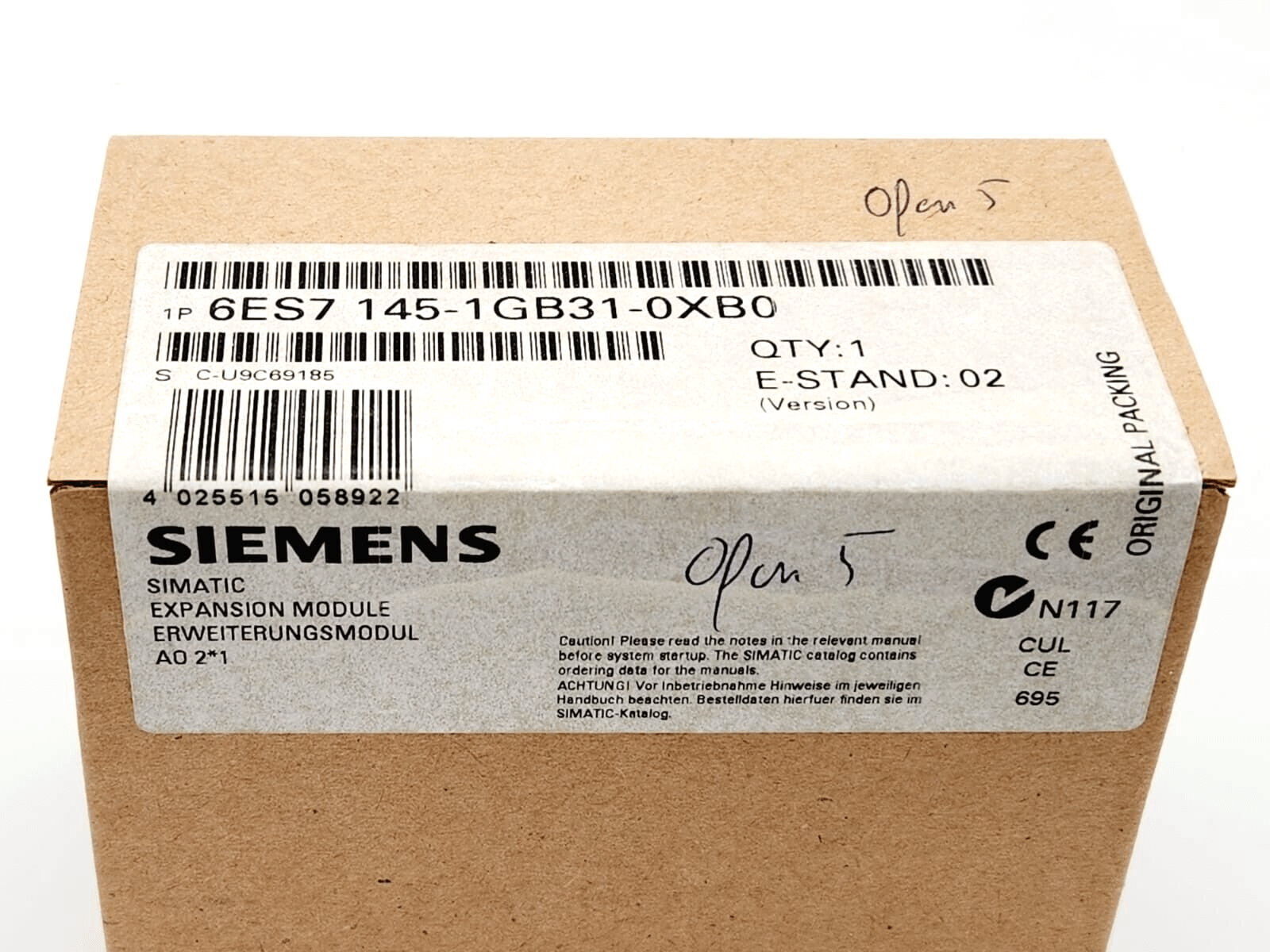 Siemens SIMATIC DP EM 145 expansion module sealed box labeled 6ES7145-1GB31-0XB0 with product details visible