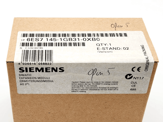 Siemens SIMATIC DP EM 145 expansion module sealed box labeled 6ES7145-1GB31-0XB0 with product details visible