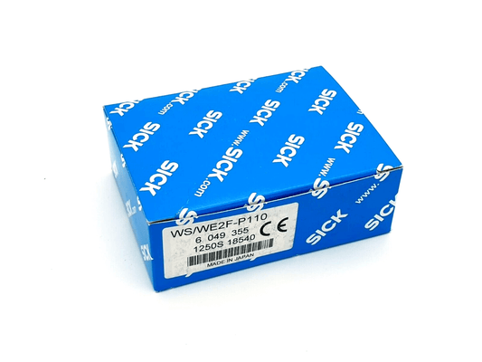 Blue box of Sick 6049355 WS/WE2F-P110 miniatur-Lichtschranken W2, showing product label and logos.