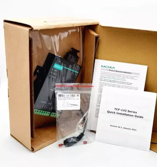 Moxa TCF-142-M-SC-T Media Converter with installation guide and accessories in packaging.