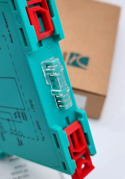 Close-up of Pepperl+Fuchs 87521 VAA-4E-KF-ZE AS-Interface Sensor Module 4 DC-Eingänge with packaging in background