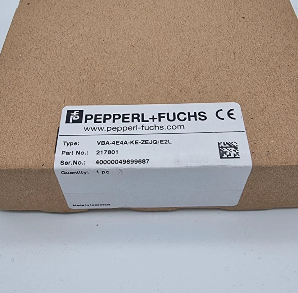 Packaging of Pepperl+Fuchs 217801 VBA-4E4A-KE-ZEJQ/E2L AS-Interface-Sensor-/Aktuatormodul with label information.