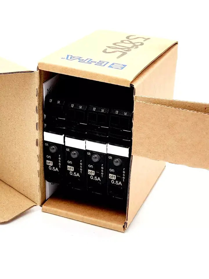 ETA Sicherungsautomat ESX10-TB-101-DC24V-0,5A in open box, showing multiple units, ready for installation.