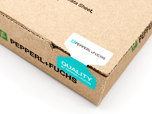 Pepperl+Fuchs product packaging with quality label on a cardboard box.
