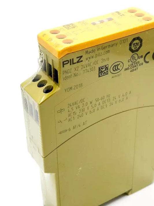 Pilz 774303 PNOZ X2 24VAC/DC safety relay, standalone, with screw terminals and safety monitoring features, side view.