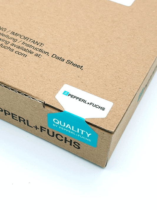 Pepperl+Fuchs product packaging with quality seal and logo on a cardboard box corner