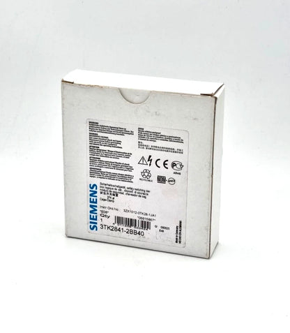 Packaging of Siemens 3TK2841-2BB40 Sicherheitsschaltgerät DC 24 V, displaying specifications and model details.