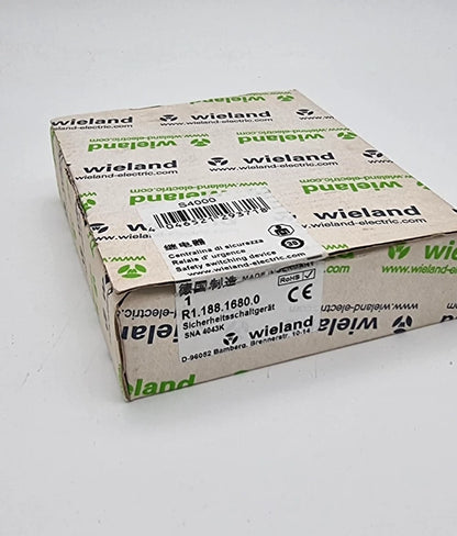 Packaging of Wieland R1.188.1810.0 SNA4043K-A Sicherheitsschaltgerät with manufacturer and model information visible.