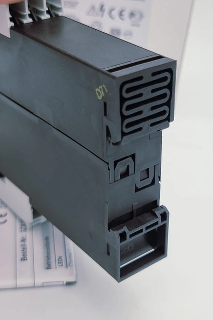 Close-up of Siemens 3TK2830-1AL20 Sicherheitsschaltgerät AC 230 V, showcasing detailed design and connectors.