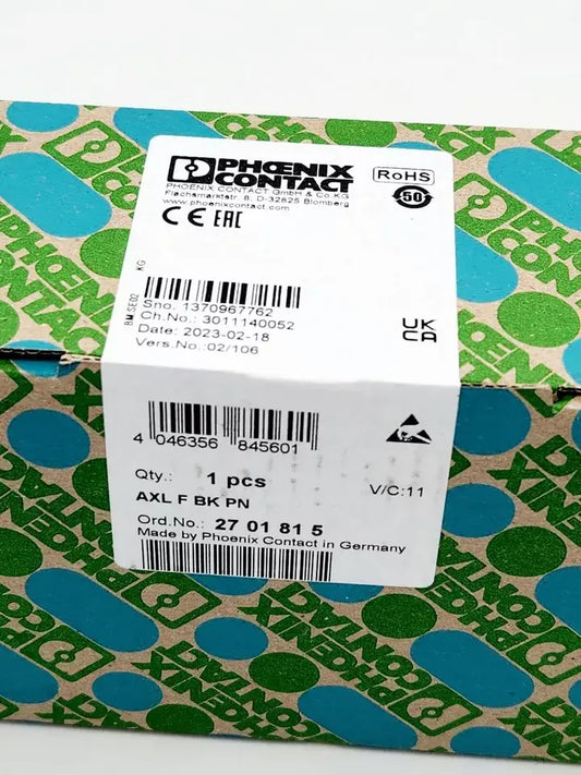 Phoenix Contact AXL F BK PN Buskoppler packaging with label showing part number 2701815 and QR code.