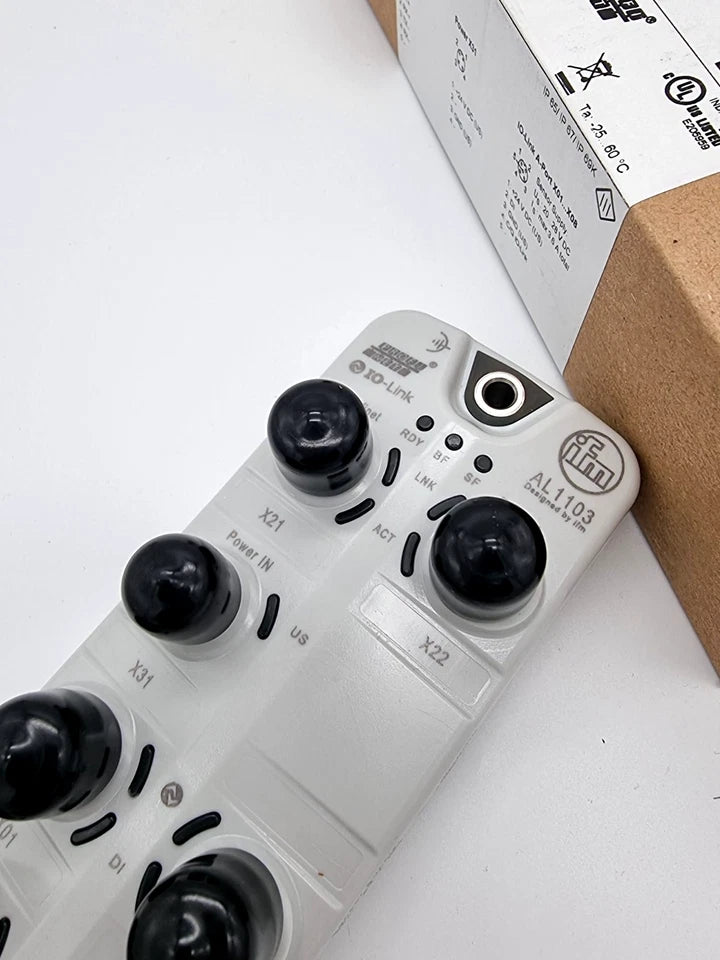 Close-up of ifm AL1103 IO-Link Master Feldbus SL PN 8P IP69K with original packaging.