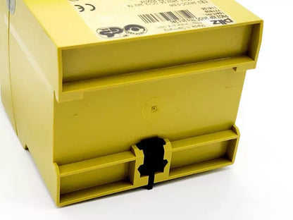 Pilz 777609 PNOZ X9P safety relay, yellow casing, rear view showing connections and model label, used for various safety applications
