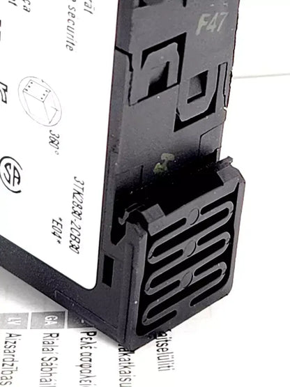 Siemens 3TK2830-2CB30 safety relay device with relay release circuits, shown with electrical connections and label details.