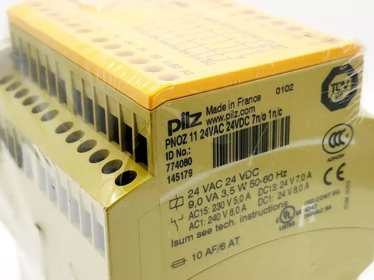 Pilz 774080 PNOZ 11 safety relay device, 24VAC/24VDC, 7n/o, 1n/c, for emergency stop and safety gate monitoring.